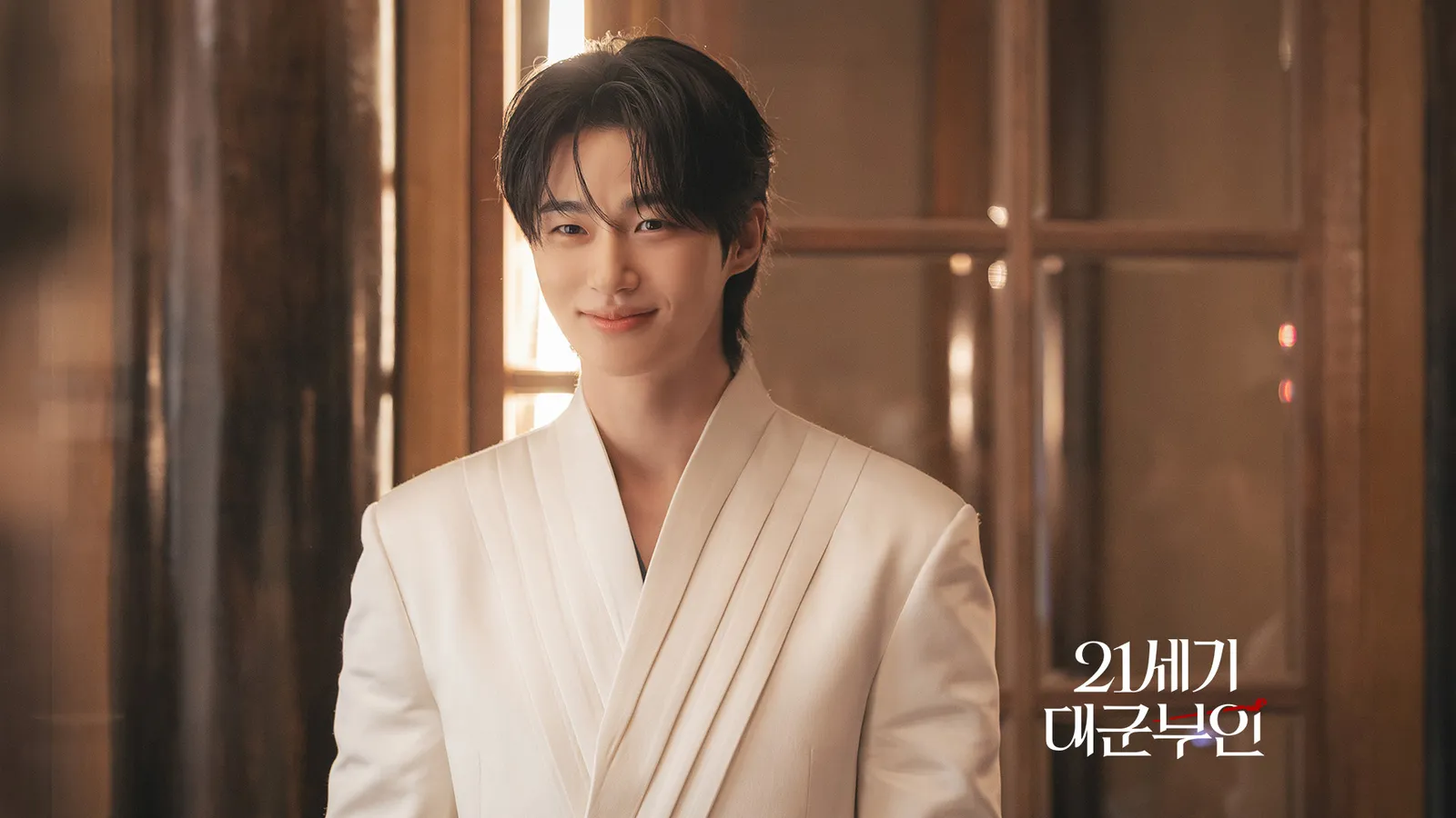 Prince I-an smiling in white hanbok inside the royal residence